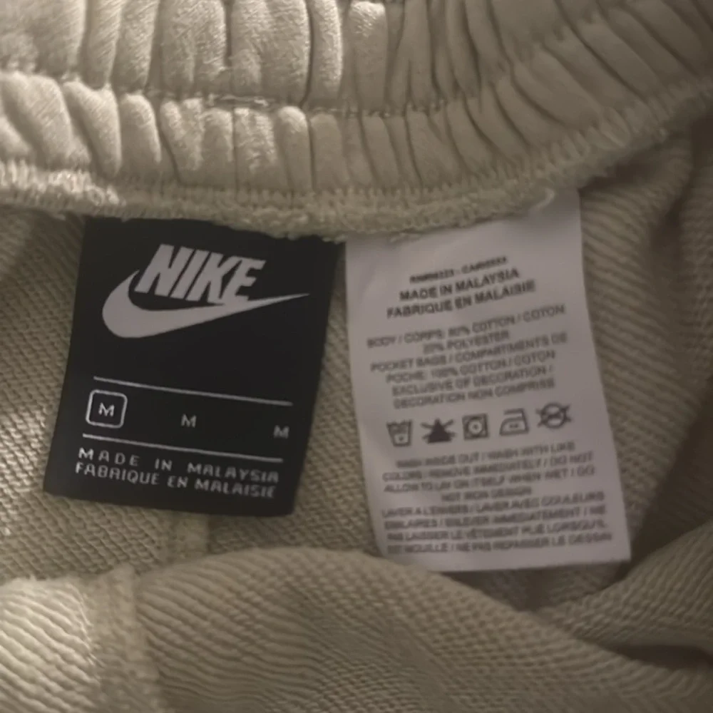 Green Nike sweat shorts